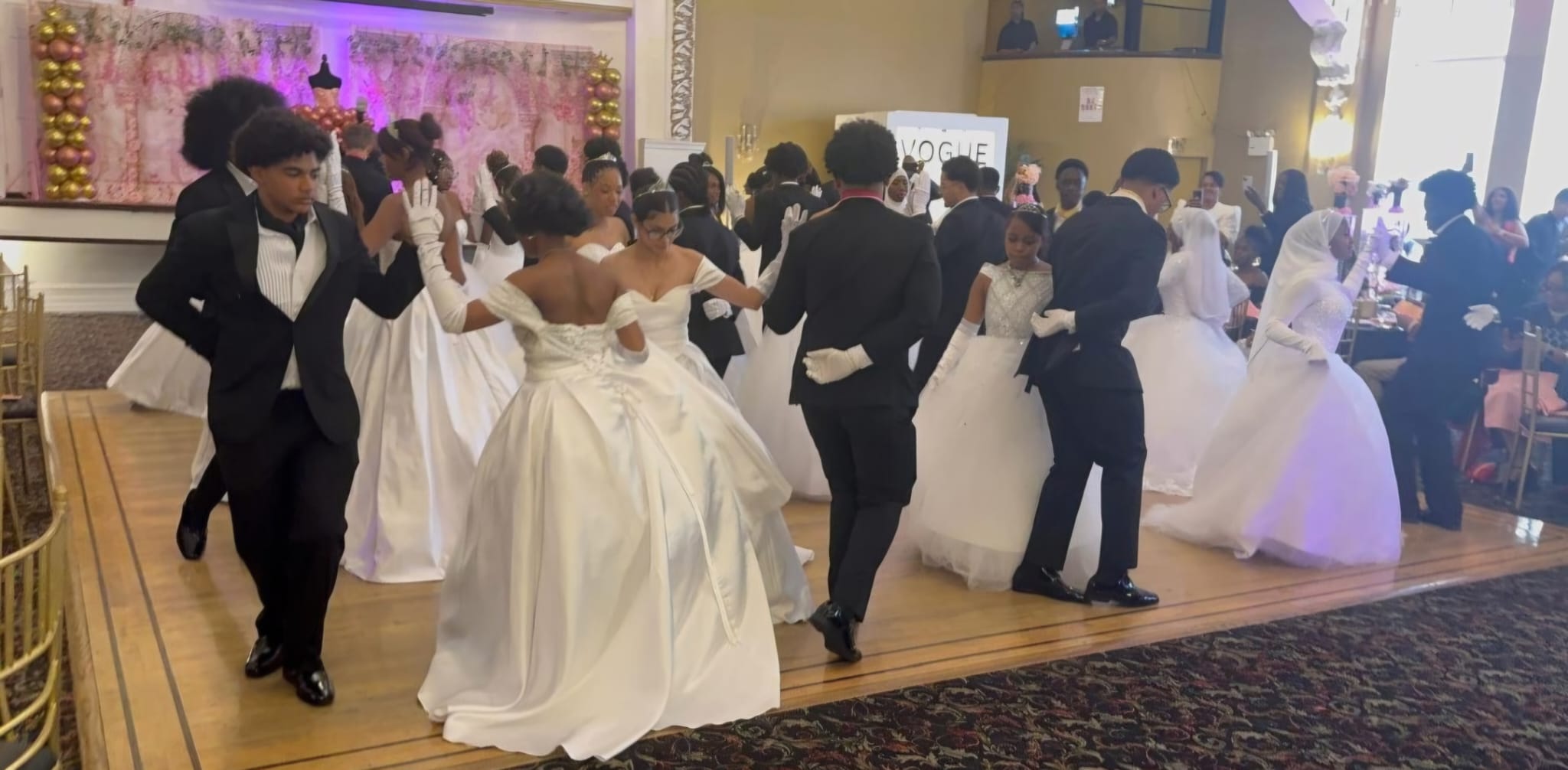 MEG cotillion students in formal presentation gowns and tuxedos